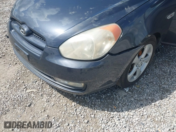2008 Hyundai Accent SE z VIN KMHCN36C28U063313, wystawiony jako IAAI lot #42241892 z przebiegiem 147 097 mil mil oraz . Historia ofert i sprzedaży dostępna na DreamBid. Obrazek 12.