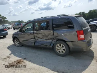 2010 Chrysler Town & Country Touring Plus with VIN 2A4RR8DX8AR382153, listed as a Copart auction lot 56470045 with 272,459 mi miles and Salvage Title. Bid and sale history available at DreamBid. Image 2.