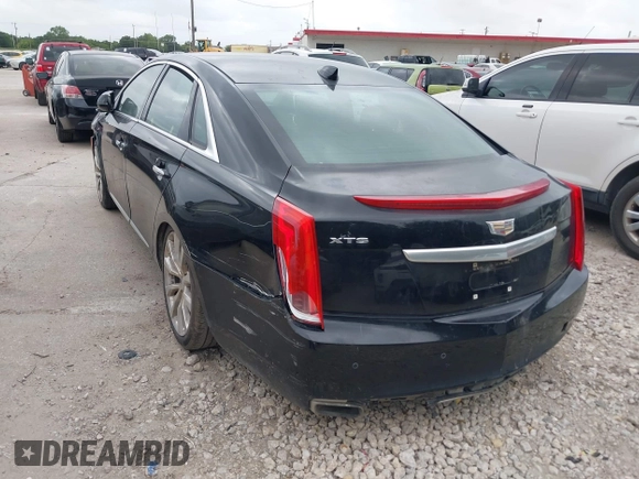 2017 Cadillac XTS Luxury z VIN 2G61M5S32H9158776, wystawiony jako IAAI lot #42528442 z przebiegiem 90 680 mil mil oraz . Historia ofert i sprzedaży dostępna na DreamBid. Obrazek 3.