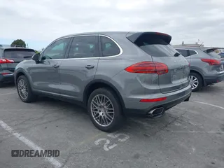 2016 Porsche Cayenne with VIN WP1AA2A27GKA15797, listed as a IAAI auction lot 42063043 with 81,464 mi miles. Bid and sale history available at carsss.com. Image 3.