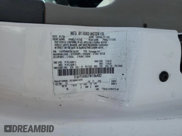 2007 Ford Focus S z VIN 1FAFP34NX7W106482, wystawiony jako Copart lot #57675245 z przebiegiem 170 237 mil mil oraz Szkoda całkowita • Salvage title. Historia ofert i sprzedaży dostępna na DreamBid. Obrazek 12.