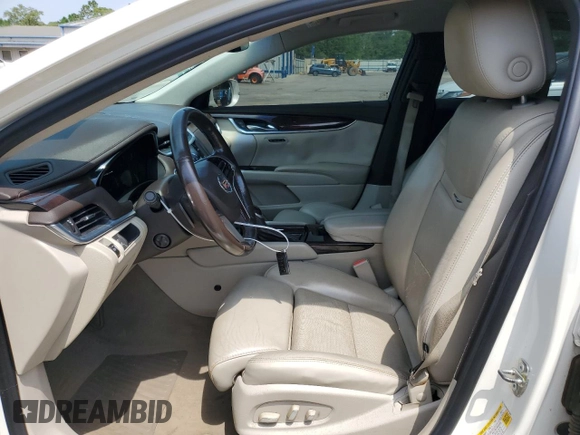 2014 Cadillac XTS Luxury z VIN 2G61M5S38E9215641, wystawiony jako Copart lot #53188695 z przebiegiem 97 431 mil mil oraz Szkody całkowita. Historia ofert i sprzedaży dostępna na DreamBid. Obrazek 7.