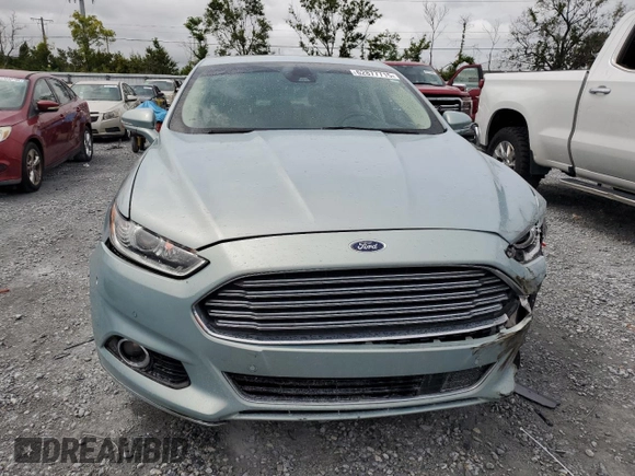 2013 Ford Fusion SE Hybrid z VIN 3FA6P0LU6DR174719, wystawiony jako Copart lot #62877715 z przebiegiem 52 884 mil mil oraz Szkoda całkowita • Salvage title. Historia ofert i sprzedaży dostępna na DreamBid. Obrazek 5.
