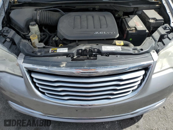 2013 Chrysler Town & Country Touring z VIN 2C4RC1BG0DR630188, wystawiony jako Copart lot #53320815 z przebiegiem 115 026 mil mil oraz Szkoda całkowita • Salvage title. Historia ofert i sprzedaży dostępna na DreamBid. Obrazek 12.