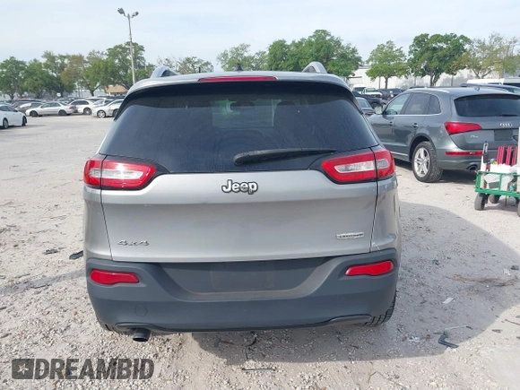 2014 Jeep Cherokee Altitude with VIN 1C4PJMCB4EW107556, listed as a IAAI auction lot 41881448 with 212,816 mi miles and . Bid and sale history available at DreamBid. Image 17.