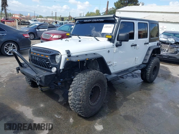 2017 Jeep Wrangler Unlimited Sahara z VIN 1C4BJWEG5HL731242, wystawiony jako IAAI lot #41891017 z przebiegiem 97 097 mil mil oraz . Historia ofert i sprzedaży dostępna na DreamBid. Obrazek 2.