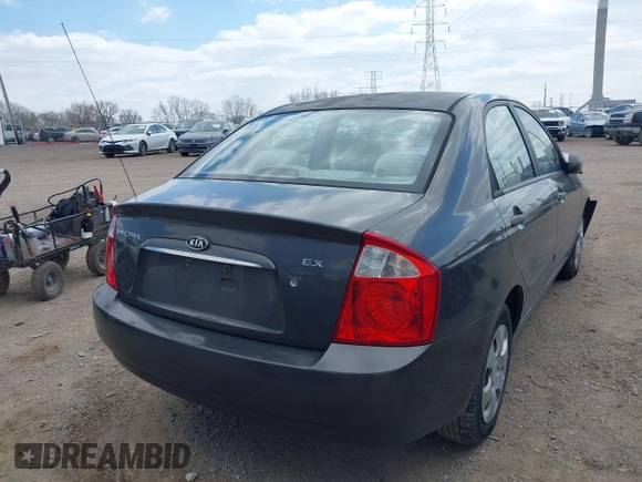 2006 Kia Spectra EX with VIN KNAFE121365346365, listed as a IAAI auction lot 42023727 with 87,345 mi miles and . Bid and sale history available at DreamBid. Image 4.