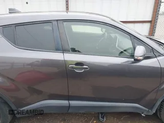 2020 Toyota C-HR LE z VIN JTNKHMBX0L1073916, wystawiony jako IAAI lot #41720784 z przebiegiem 96 730 mil mil oraz . Historia ofert i sprzedaży dostępna na DreamBid. Obrazek 13.