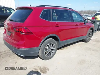 2019 Volkswagen Tiguan SE with VIN 3VV3B7AX3KM130075, listed as a IAAI auction lot 41807584 with 57,308 mi miles and . Bid and sale history available at DreamBid. Image 4.