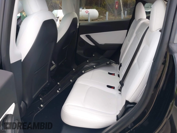 2020 Tesla Model Y Long Range with VIN 5YJYGDEF2LF037298, listed as a IAAI auction lot 37832056 with 40,417 mi miles and . Bid and sale history available at DreamBid. Image 8.