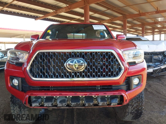 2018 Toyota Tacoma SR with VIN 3TMCZ5AN8JM141486, listed as a IAAI auction lot 42142145 with 54,851 mi miles and . Bid and sale history available at DreamBid. Image 12.