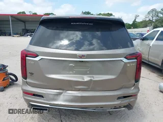 2022 Cadillac XT6 Premium Luxury z VIN 1GYKPCRS4NZ107852, wystawiony jako IAAI lot #42075012 z przebiegiem 66 046 mil mil oraz . Historia ofert i sprzedaży dostępna na DreamBid. Obrazek 16.