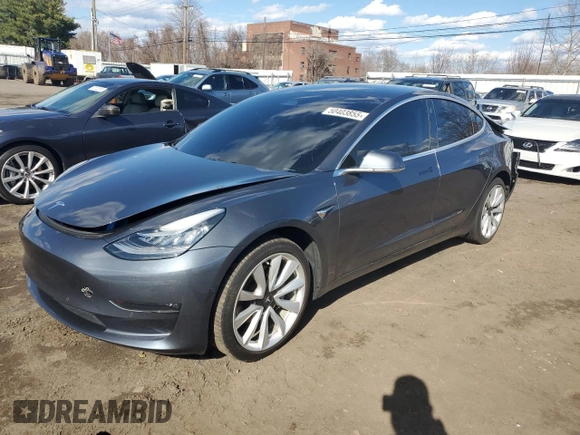 2019 Tesla Model 3 Mid Range with VIN 5YJ3E1EA6KF312754, listed as a Copart auction lot 50403855 with 148,217 mi miles and Salvage Title. Bid and sale history available at carsss.com. Image 1.