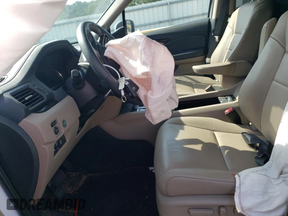 2022 Honda Pilot Touring 7-Passenger with VIN 5FNYF6H64NB054732, listed as a Copart auction lot 63036104 with 33,252 mi miles and Salvage Title. Bid and sale history available at carsss.com. Image 7.