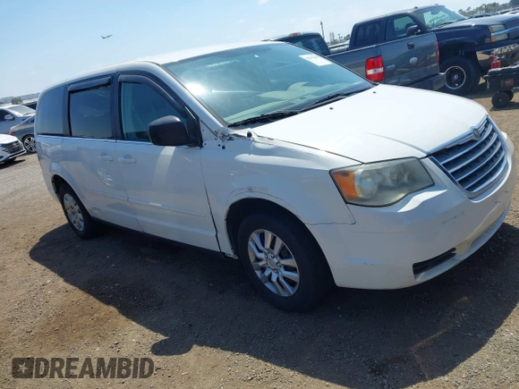 2009 Chrysler Town & Country LX with VIN 2A8HR44E79R549129, listed as a IAAI auction lot 42079369 with 102,805 mi miles. Bid and sale history available at carsss.com. Image 1.