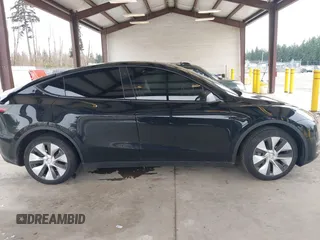 2023 Tesla Model Y Long Range with VIN 7SAYGDEE4PF789102, listed as a IAAI auction lot 41788860 with 88,457 mi miles and . Bid and sale history available at DreamBid. Image 13.