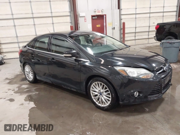 2014 Ford Focus Titanium with VIN 1FADP3J22EL199563, listed as a IAAI auction lot 41450106 with 129,271 mi miles. Bid and sale history available at carsss.com. Image 1.