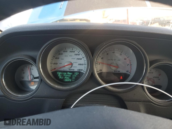 2010 Dodge Challenger SRT-8 with VIN 2B3CJ7DW7AH130521, listed as a Copart auction lot 88990235 with 128,370 mi miles and Salvage title. Bid and sale history available at DreamBid. Image 9.