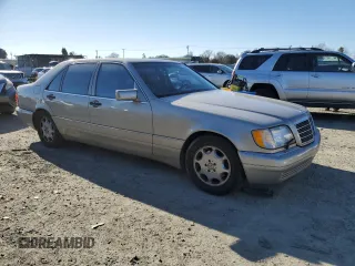 1996 Mercedes-Benz S with VIN WDBGA43E9TA311921, listed as a Copart auction lot 88758965 with 141,035 mi miles and Salvage Title. Bid and sale history available at DreamBid. Image 4.