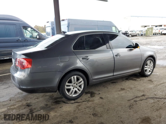 2007 Volkswagen Jetta z VIN 3VWDG71K47M101262, wystawiony jako Copart lot #51469695 z przebiegiem 241 174 mil mil oraz Szkoda całkowita • Salvage title. Historia ofert i sprzedaży dostępna na DreamBid. Obrazek 3.