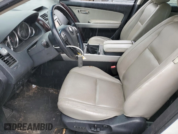 2014 Mazda CX-9 Grand Touring with VIN JM3TB2DA5E0438288, listed as a Copart auction lot 56970705 with 147,526 mi miles and Salvage title. Bid and sale history available at DreamBid. Image 7.