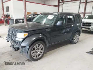 2010 Dodge Nitro Heat z VIN 1D4PT4GK4AW173980, wystawiony jako IAAI lot #41842870 z przebiegiem 165 087 mil mil oraz . Historia ofert i sprzedaży dostępna na DreamBid. Obrazek 2.