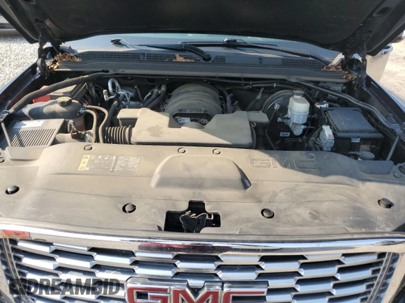 2019 GMC Yukon XL Denali with VIN 1GKS2HKJ7KR174772, listed as a Copart auction lot 63087134 with 69,692 mi miles and Salvage Title. Bid and sale history available at carsss.com. Image 12.