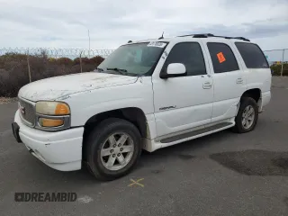 2005 GMC Yukon Denali z VIN 1GKEK63UX5J194771, wystawiony jako Copart lot #53170035 z przebiegiem 175 910 mil mil oraz Tytuł czysty. Historia ofert i sprzedaży dostępna na DreamBid. Obrazek 1.