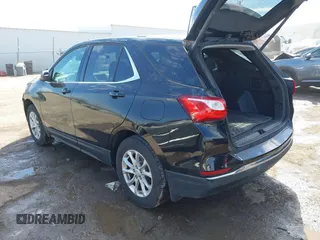 2019 Chevrolet Equinox LT z VIN 3GNAXUEV0KL216360, wystawiony jako IAAI lot #41664268 z przebiegiem 69 411 mil mil oraz . Historia ofert i sprzedaży dostępna na DreamBid. Obrazek 3.