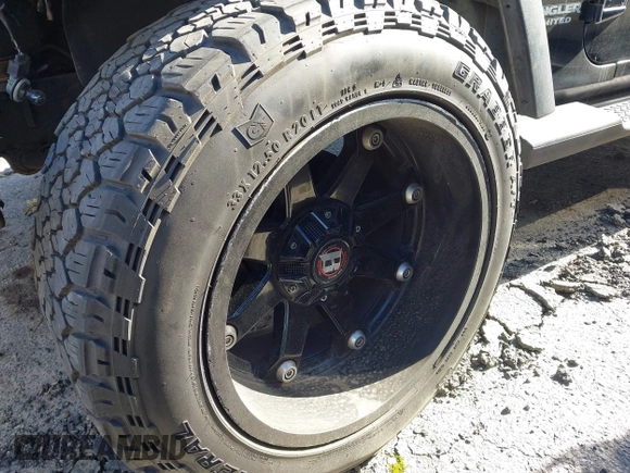 2012 Jeep Wrangler Unlimited Sport with VIN 1C4BJWDG8CL246829, listed as a IAAI auction lot 41816197 with 198,502 mi miles. Bid and sale history available at carsss.com. Image 19.