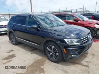 2019 Volkswagen Tiguan SE with VIN 3VV3B7AX0KM064326, listed as a IAAI auction lot 42237813 with 100,400 mi miles and . Bid and sale history available at DreamBid. Image 1.