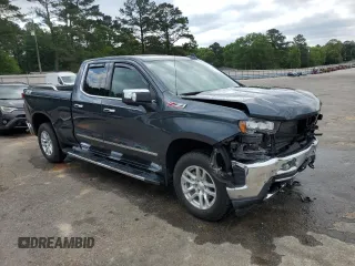 2019 Chevrolet Silverado 1500 LTZ with VIN 1GCRYGED4KZ177685, listed as a Copart auction lot 52803145 with 23,049 mi miles and Salvage Title. Bid and sale history available at DreamBid. Image 4.