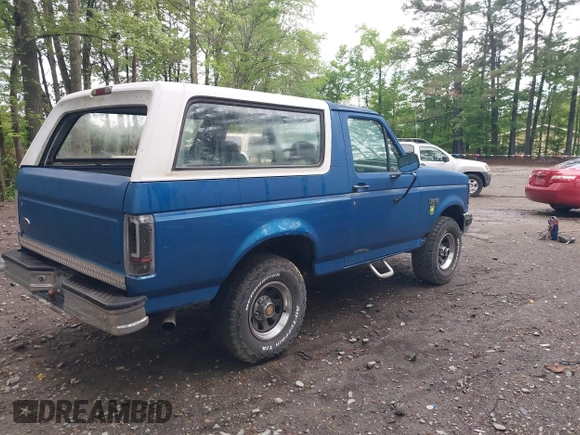 1992 Ford Bronco XL with VIN 1FMEU15N8NLA71453, listed as a IAAI auction lot 42169254 with 141,614 mi miles. Bid and sale history available at carsss.com. Image 4.