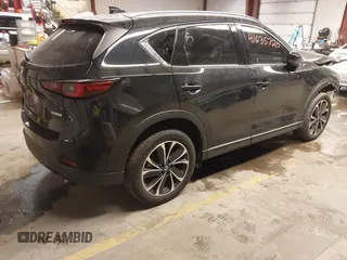 2023 Mazda CX-5 2.5 S Premium Package with VIN JM3KFBDM4P0229766, listed as a IAAI auction lot 41635720 with 38,664 mi miles. Bid and sale history available at carsss.com. Image 4.