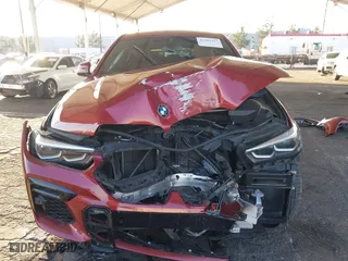 2022 BMW X6 xDrive40i with VIN 5UXCY6C06N9K57184, listed as a IAAI auction lot 41302467 with 42,073 mi miles. Bid and sale history available at carsss.com. Image 6.