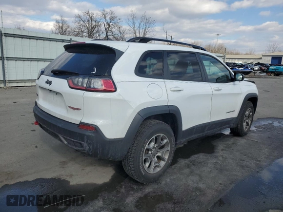 2022 Jeep Cherokee Trailhawk with VIN 1C4PJMBX7ND503943, listed as a Copart auction lot 42821495 with 24,256 mi miles and Salvage Title. Bid and sale history available at carsss.com. Image 3.