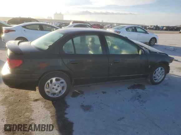 2001 Saturn SL z VIN 1G8ZK52741Z336816, wystawiony jako Copart lot #46798005 z przebiegiem 153 642 mil mil oraz Szkoda całkowita • Salvage title. Historia ofert i sprzedaży dostępna na DreamBid. Obrazek 3.