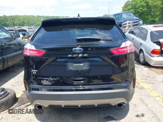 2021 Ford Edge Titanium z VIN 2FMPK3K96MBA16046, wystawiony jako IAAI lot #42137419 z przebiegiem 88 622 mil mil oraz . Historia ofert i sprzedaży dostępna na DreamBid. Obrazek 16.