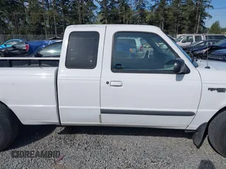 1999 Ford Ranger XLT with VIN 1FTYR14X0XPA65325, listed as a IAAI auction lot 42009611 with 218,657 mi miles. Bid and sale history available at carsss.com. Image 14.