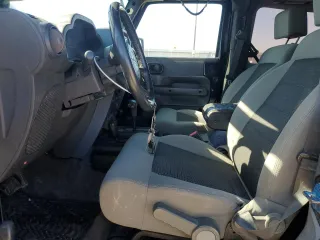 2008 Jeep Wrangler X z VIN 1J4FA24128L517522, wystawiony jako Copart lot #45706545 z przebiegiem 140 902 mil mil oraz Czysty tytuł • Clean title. Historia ofert i sprzedaży dostępna na DreamBid. Obrazek 7.