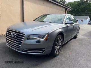 2011 Audi A8 with VIN WAURVAFD7BN018734, listed as a Copart auction lot 63735055 with 79,694 mi miles and Clean title. Bid and sale history available at DreamBid. Image 2.