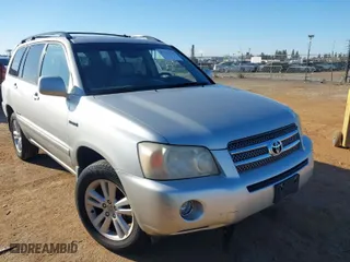 2006 Toyota Highlander Hybrid with VIN JTEDW21A360011484, listed as a IAAI auction lot 41711736 with 312,641 mi miles. Bid and sale history available at carsss.com. Image 1.