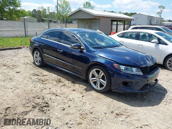 2014 Volkswagen CC R-Line with VIN WVWBP7AN7EE507463, listed as a IAAI auction lot 41984136 with 100,531 mi miles. Bid and sale history available at carsss.com. Image 1.