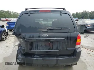 2004 Ford Escape Limited with VIN 1FMCU04164KB51256, listed as a Copart auction lot 58969565 with 137,360 mi miles and Salvage title. Bid and sale history available at DreamBid. Image 6.