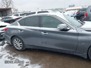 2015 Infiniti Q50 Premium with VIN JN1BV7AR0FM396192, listed as a IAAI auction lot 41564677 with 210,460 mi miles and . Bid and sale history available at DreamBid. Image 14.