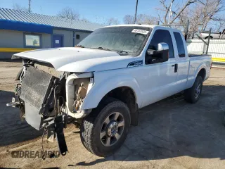 2015 Ford Super Duty F-250 SRW XLT with VIN 1FT7X2B60FED66639, listed as a Copart auction lot 46143535 with 214,720 mi miles and Salvage Title. Bid and sale history available at carsss.com. Image 1.