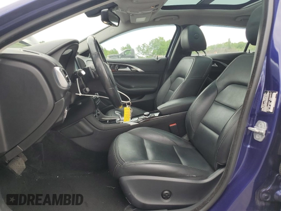 2018 Infiniti QX30 Premium with VIN SJKCH5CR4JA043584, listed as a Copart auction lot 58199085 with 81,497 mi miles and Salvage title. Bid and sale history available at DreamBid. Image 7.