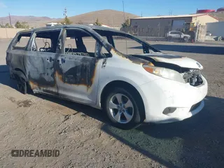 2012 Toyota Sienna LE AAS with VIN 5TDKK3DC2CS259437, listed as a IAAI auction lot 41440161 with 1 mi miles. Bid and sale history available at carsss.com. Image 1.