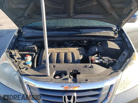2009 Honda Odyssey EX с VIN 5FNRL38449B410077, выставлен на аукционе Copart как лот 50390585 с пробегом 232 143 миль миль и Списание • Salvage title. История ставок и продаж доступна на DreamBid. Изображение 13.