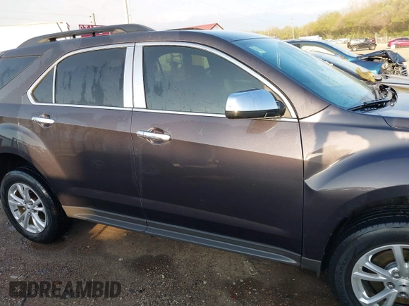 2016 Chevrolet Equinox LT z VIN 2GNALCEK5G6352863, wystawiony jako IAAI lot #42044245 z przebiegiem 92 489 mil mil oraz . Historia ofert i sprzedaży dostępna na DreamBid. Obrazek 13.
